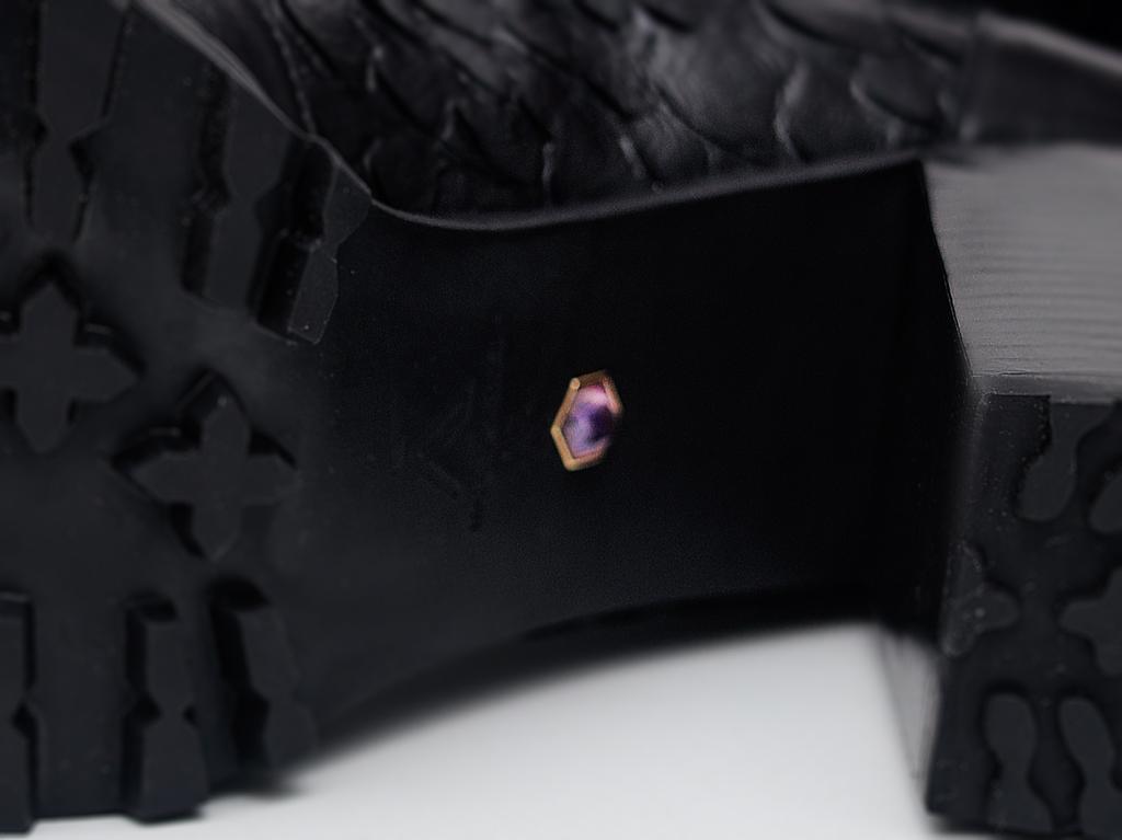 Women's black leather boots with embedded amethyst